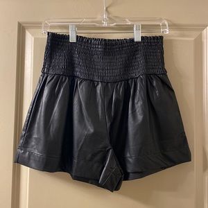 Black faux leather shorts, size small
